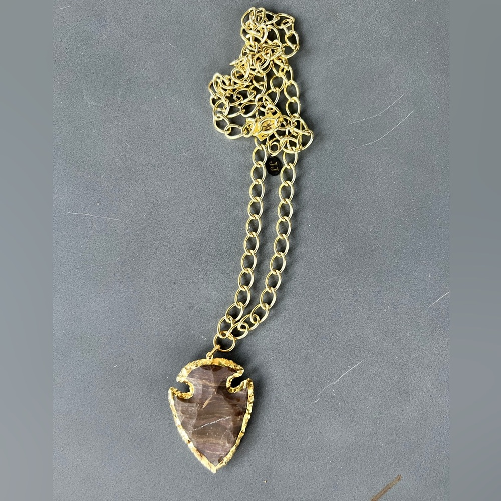 Stone arrowhead necklace on heavy gold plated chain